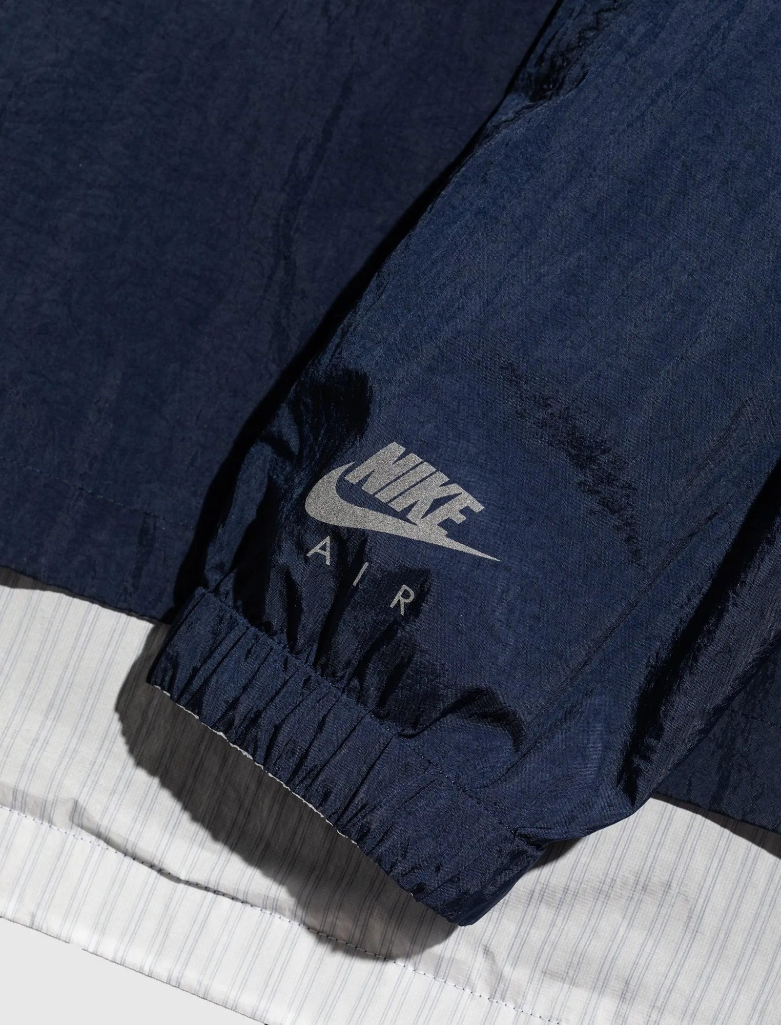 KIM JONES REVERSIBLE WINDBREAKER