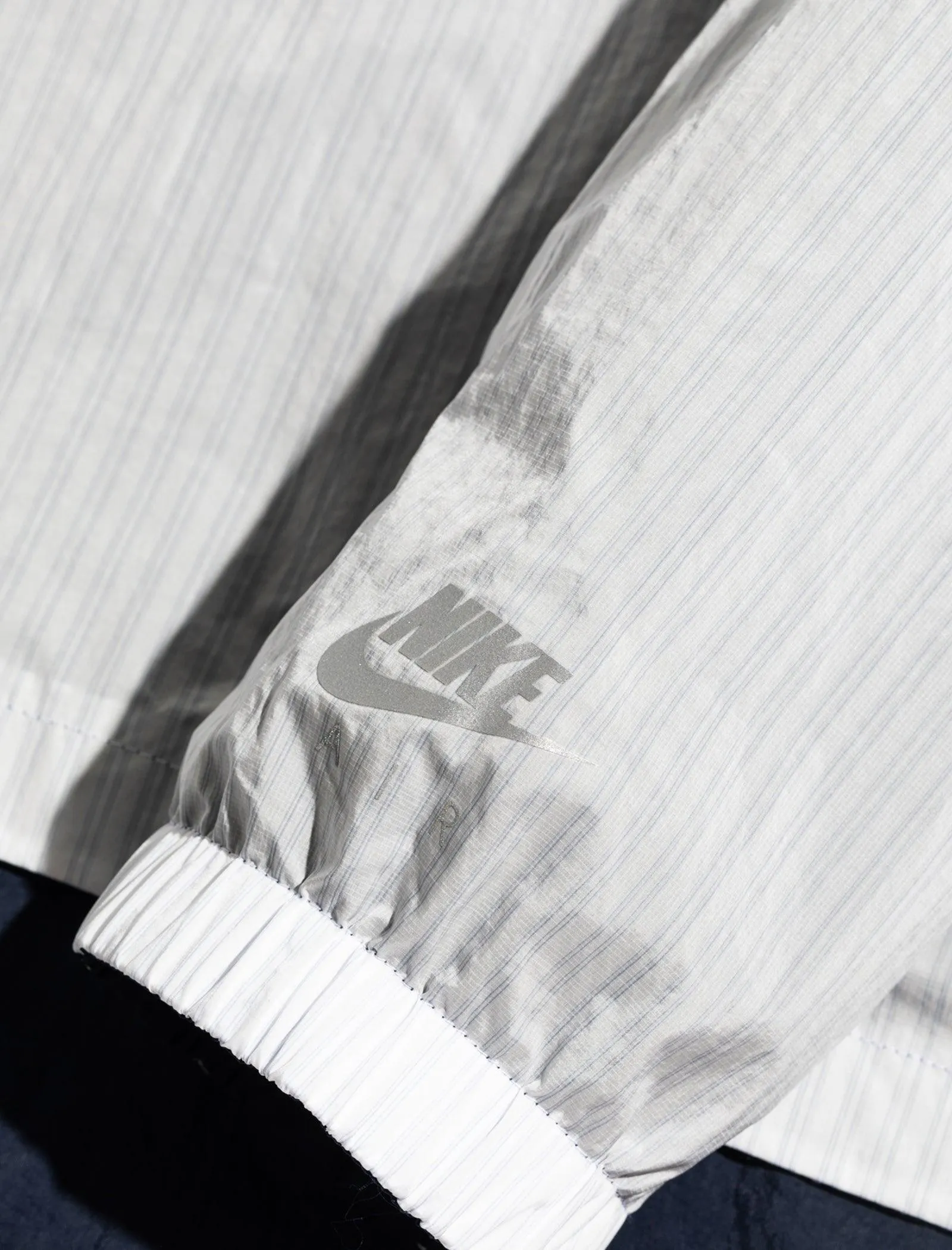 KIM JONES REVERSIBLE WINDBREAKER