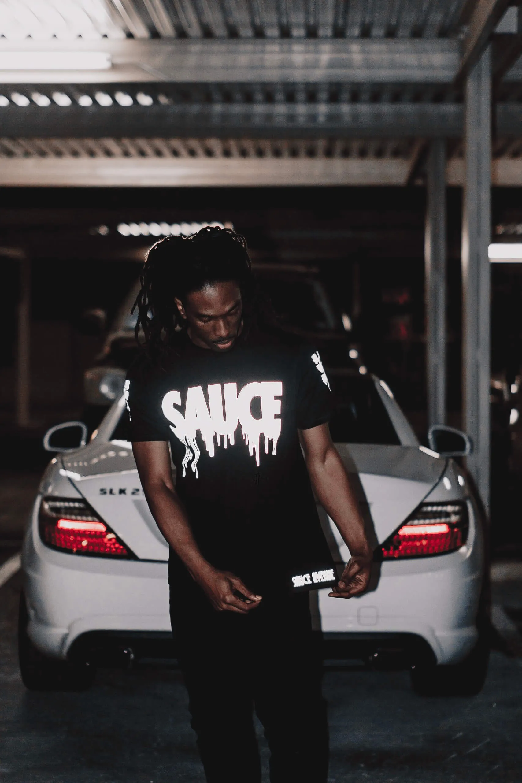 Reflective Sauce | Black Tee (Checkered Drippin Sleeve)