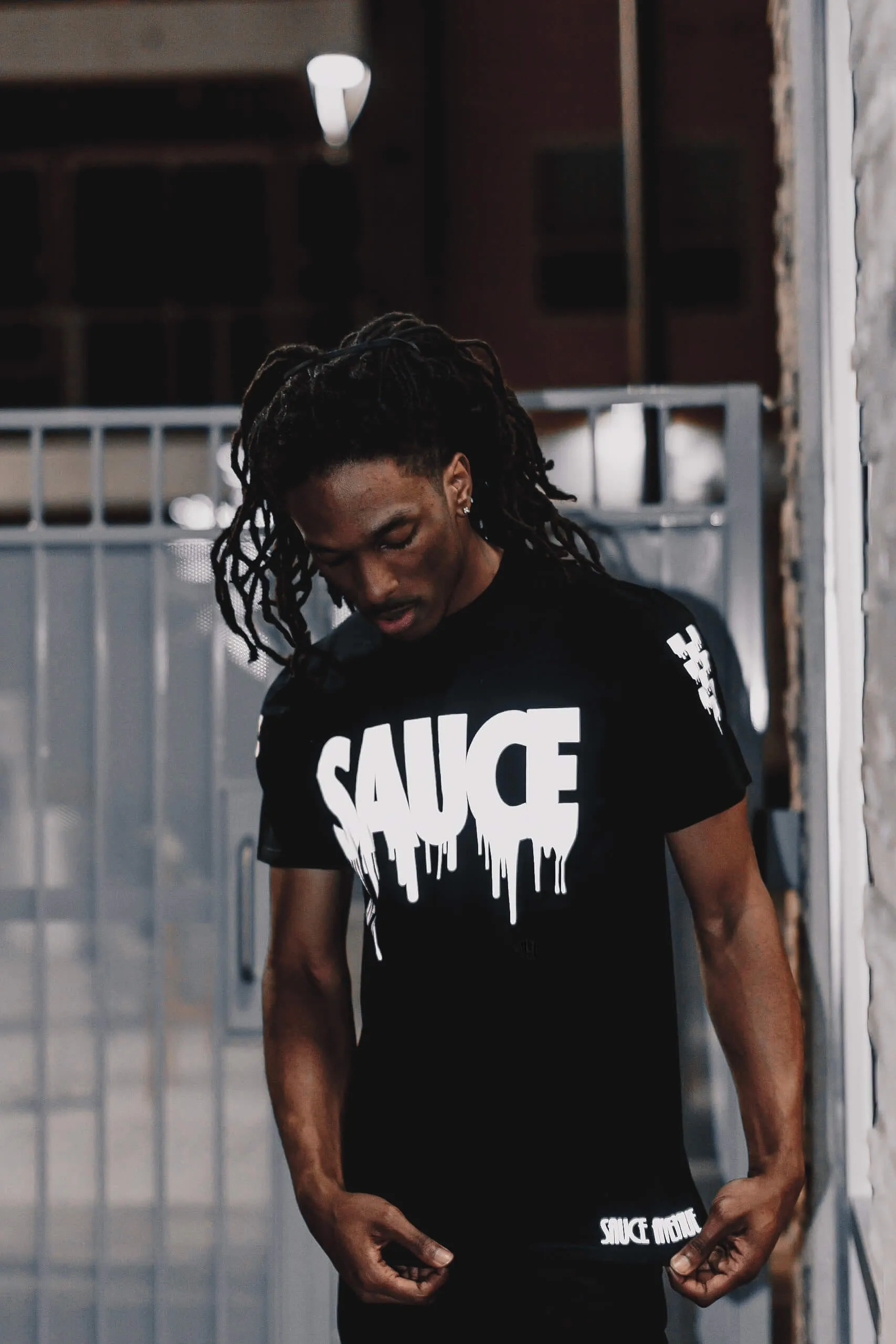 Reflective Sauce | Black Tee (Checkered Drippin Sleeve)