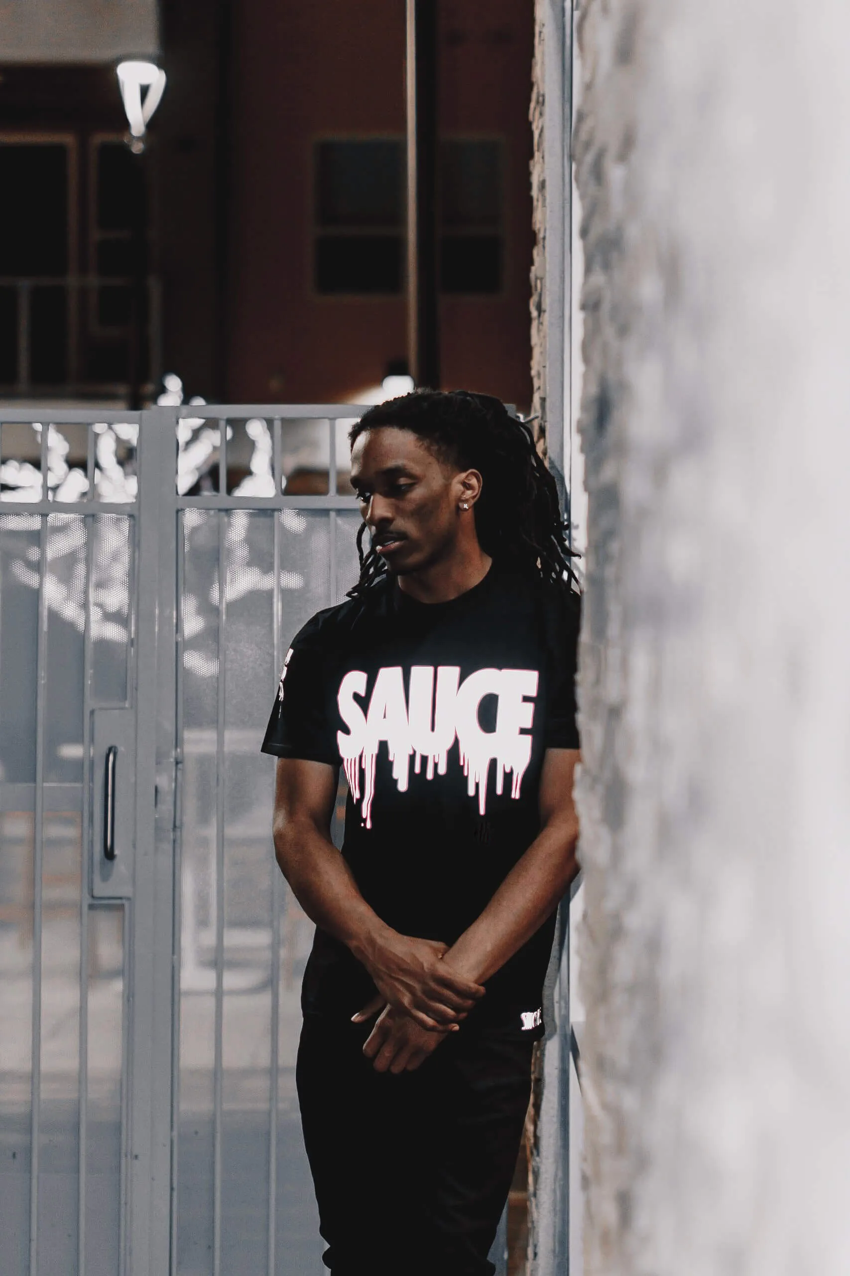 Reflective Sauce | Black Tee (Checkered Drippin Sleeve)